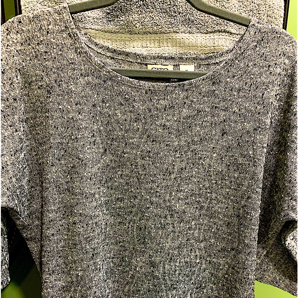 Causal blouse gray and black mixed colors it’s a 3/4 sleeve shirt. Made by Cato